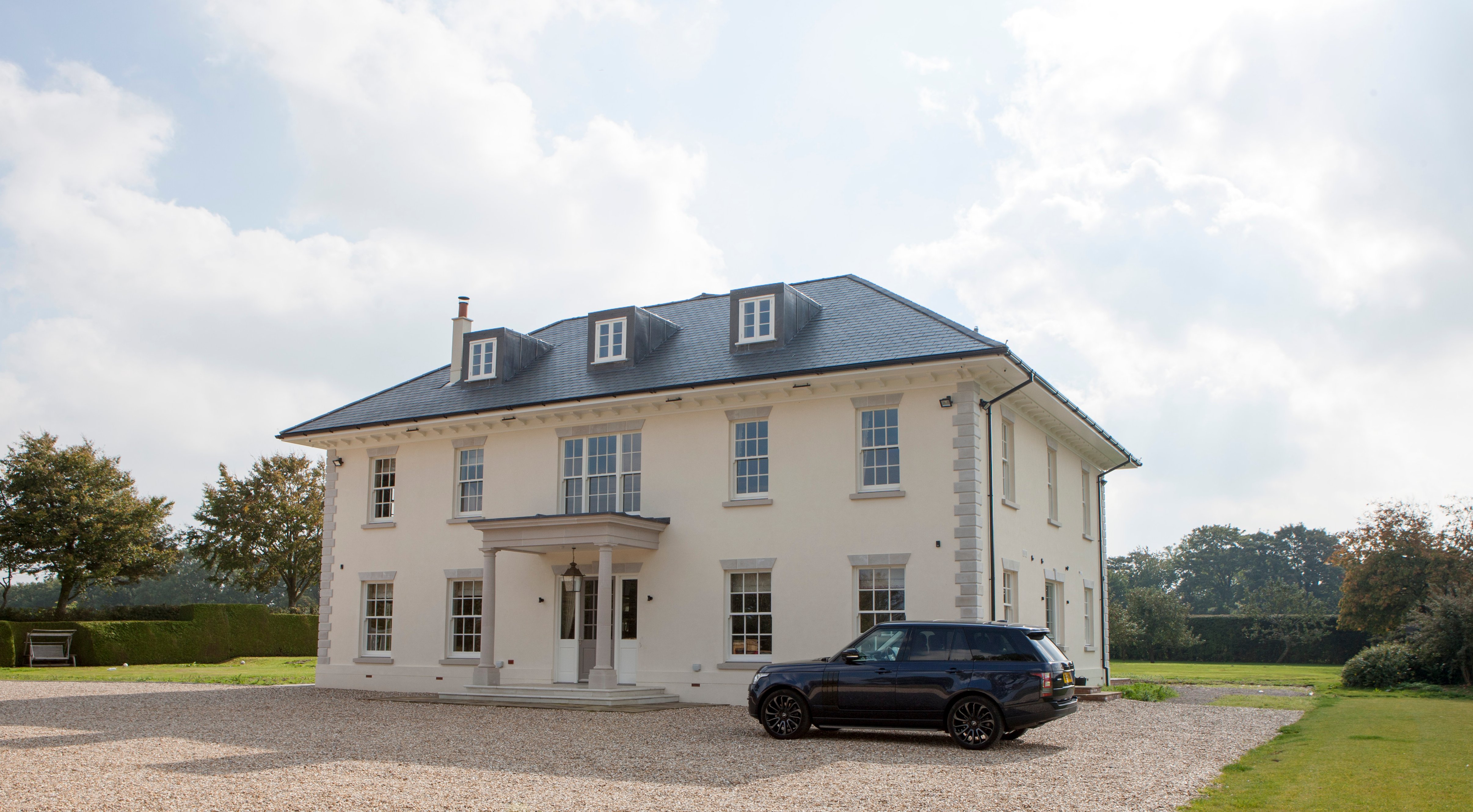 Becksteddle House in daylight, full elevation in the South Downs National Park