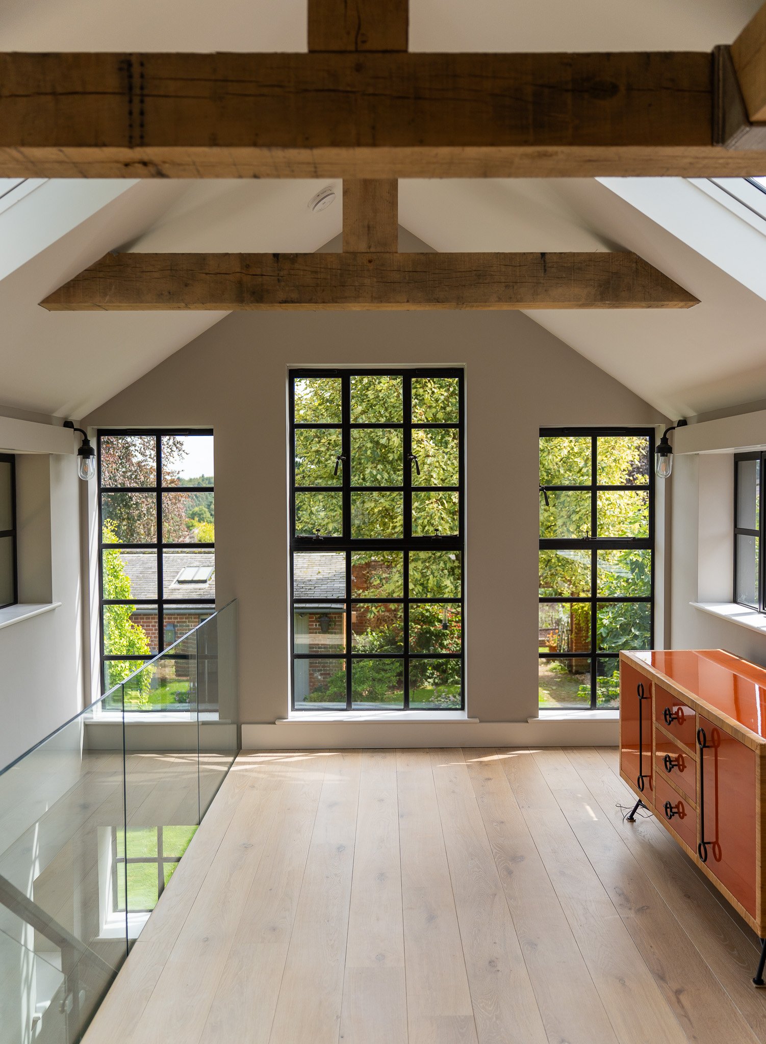 Outbuilding studio interior at Wivelrod, Crittall-style windows and oak floor