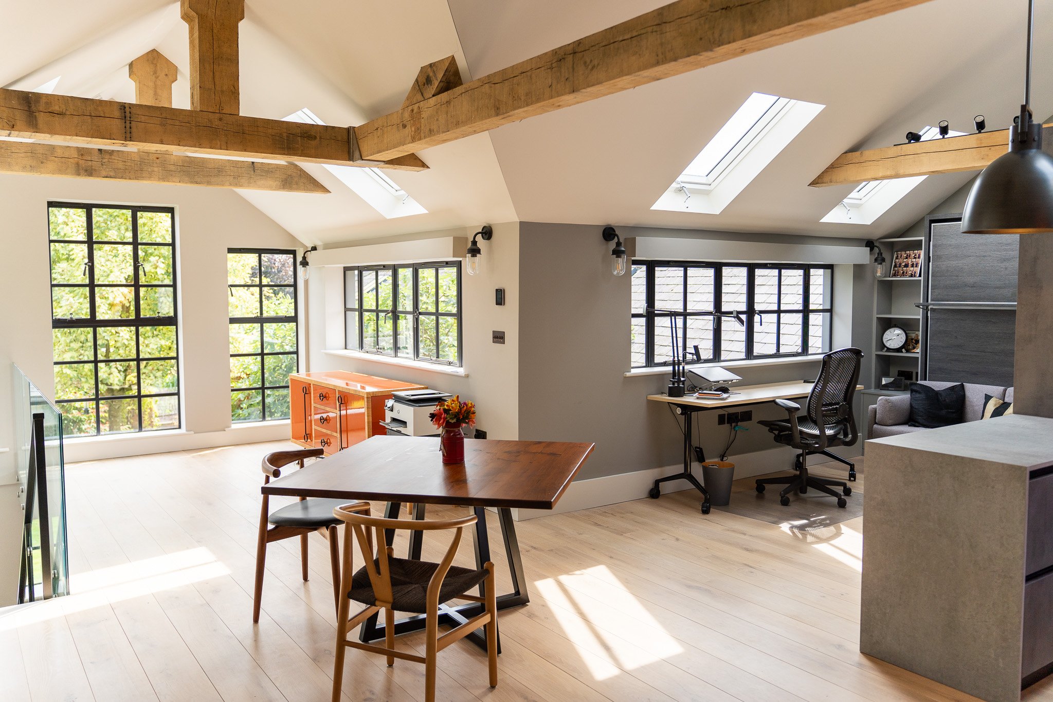 Outbuilding home office interior at Wivelrod, exposed oak beams and rooflights