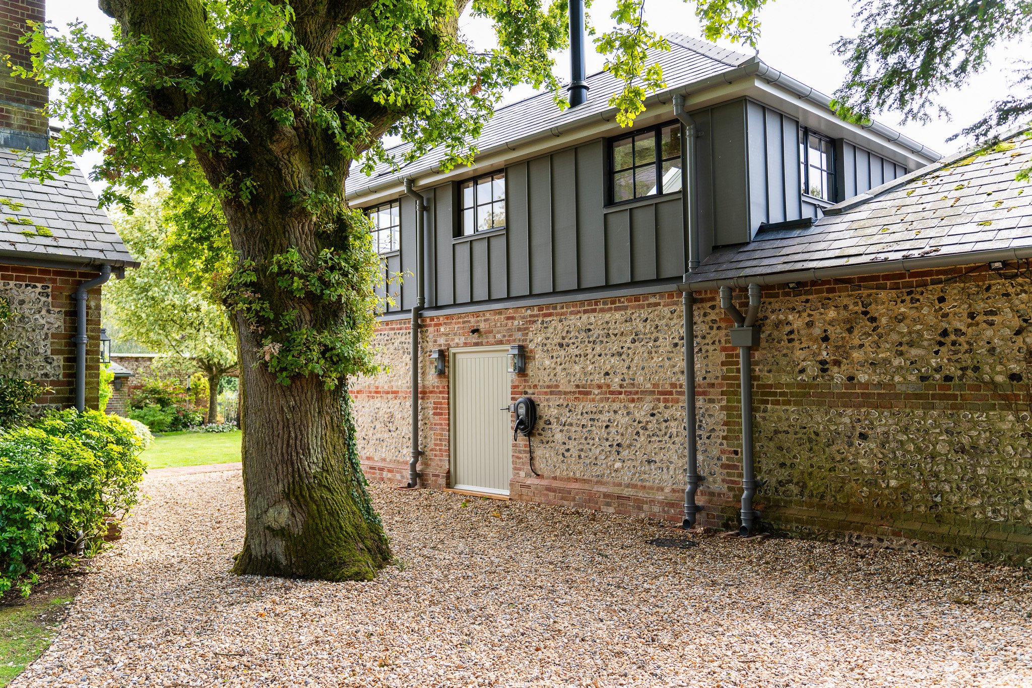 Outbuilding home office exterior at Wivelrod within its grounds